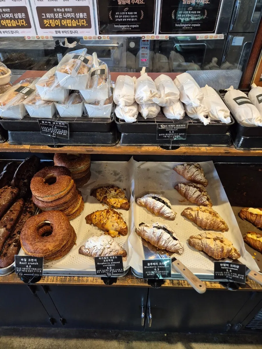 Display of mango danish and fig cream cheese baguette