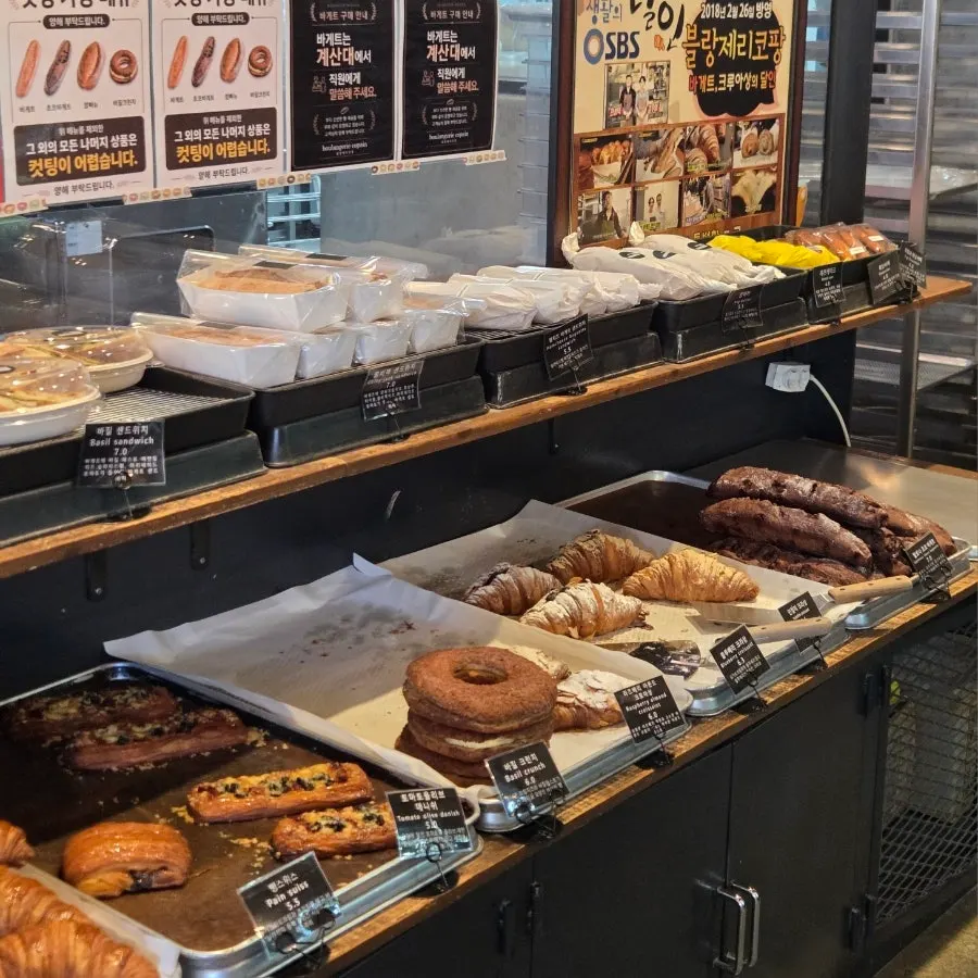 Bread display shelves inside Boulangerie Copain