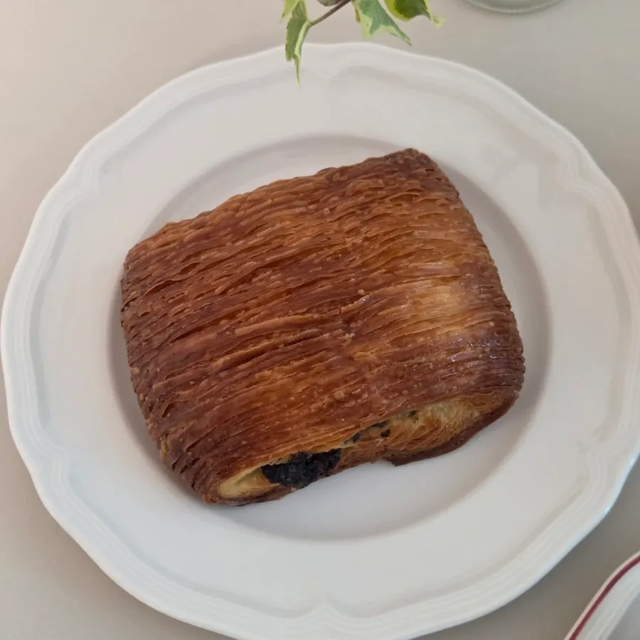 Pain au chocolat with visible flaky pastry layers