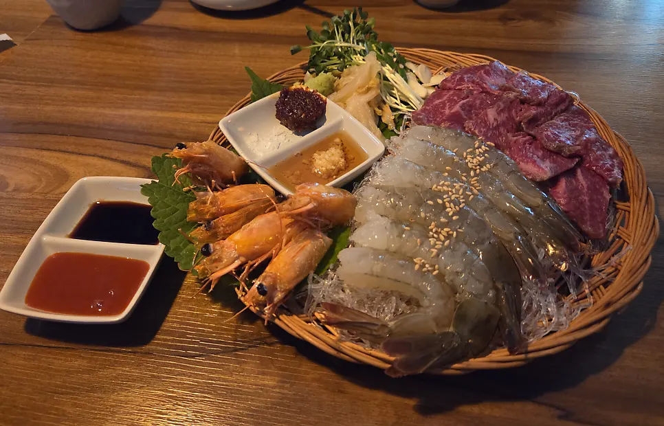 Sauces served with beef sashimi and raw shrimp