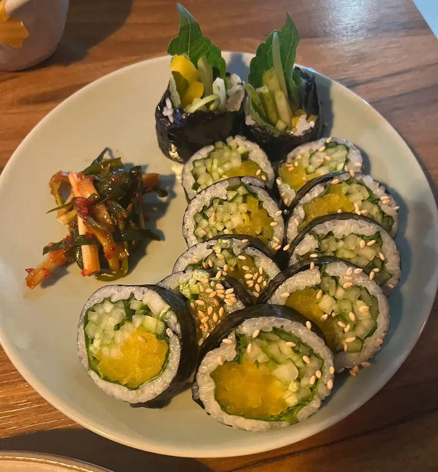 A piece of beef tartare gimbap with wasabi