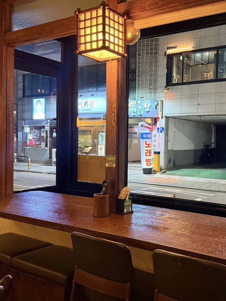 Vertical photo of Jeongju Ilga's table with snacks and drinks