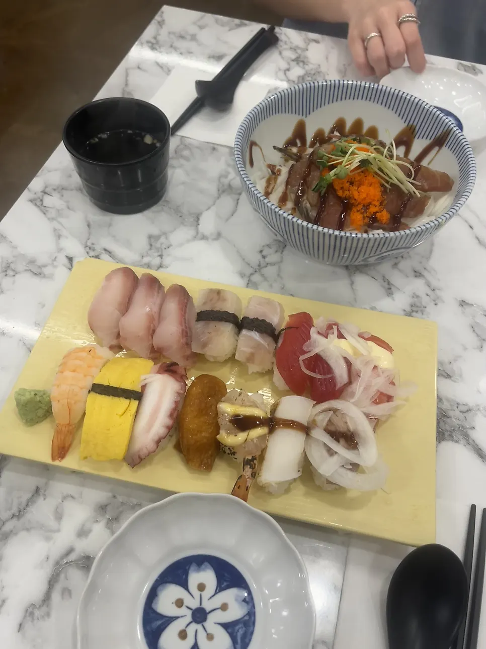 Live fish sushi and seasoned rice