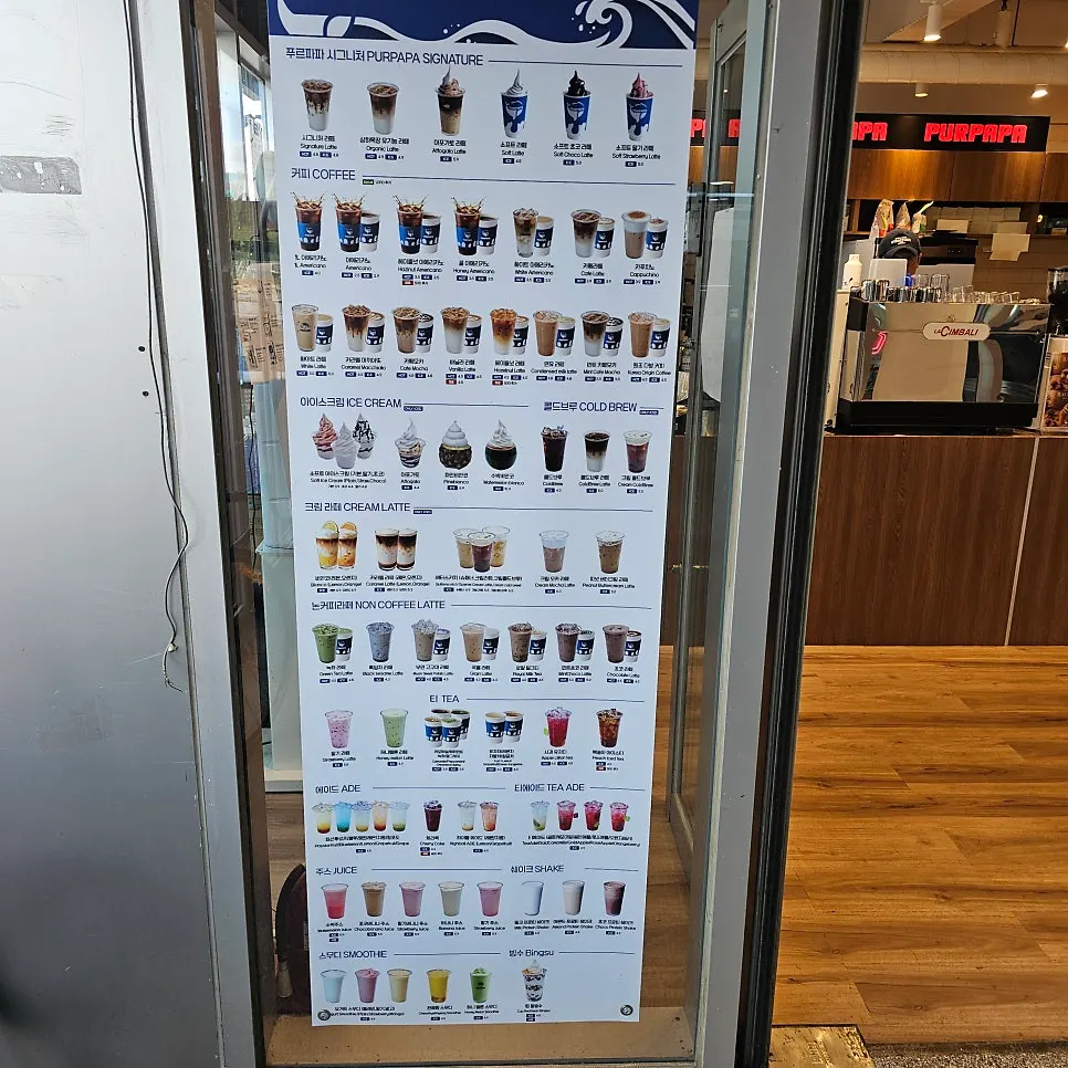 Café menu displayed on the wall