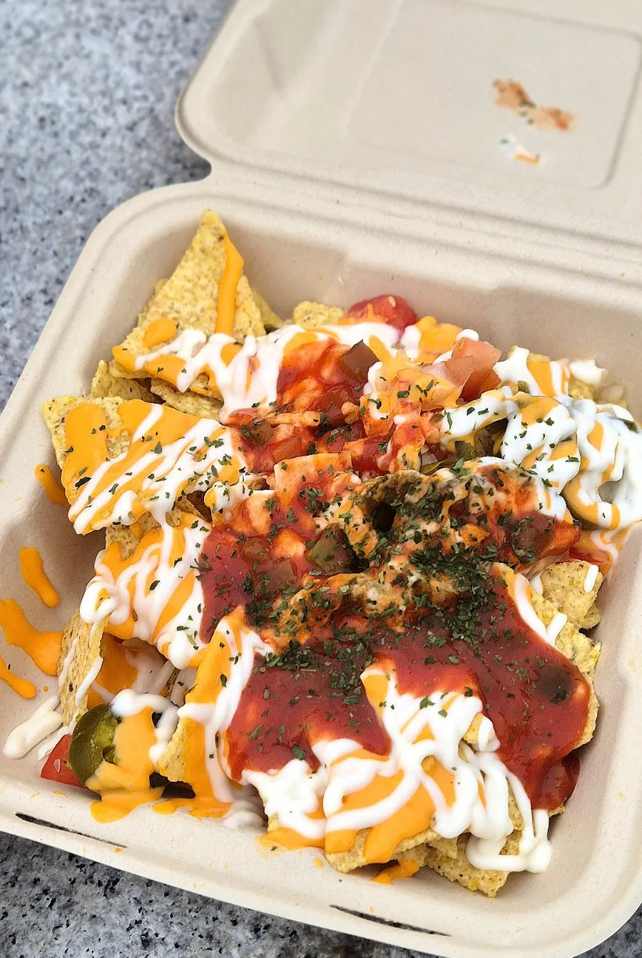 A spoonful of mixed toppings from Macho Nacho