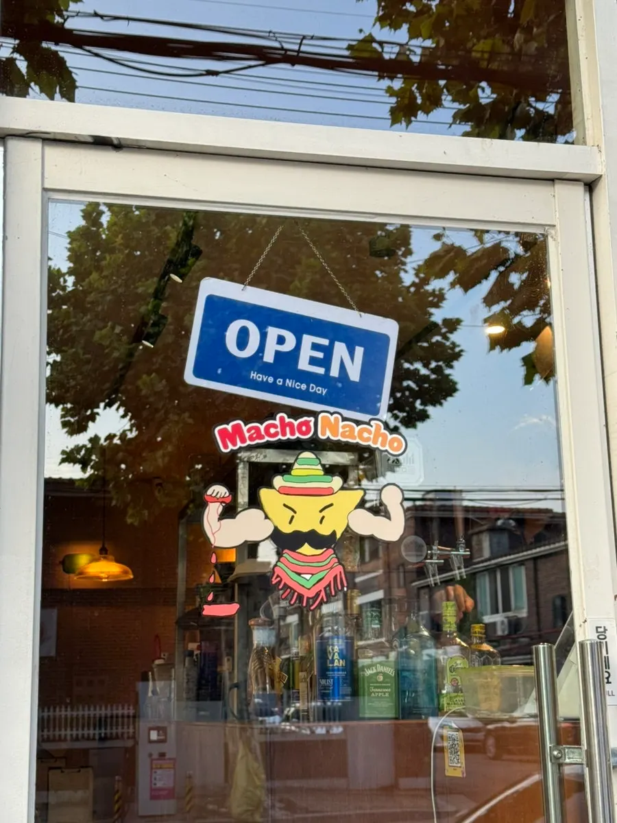 Nacho character sticker on Macho Nacho's door