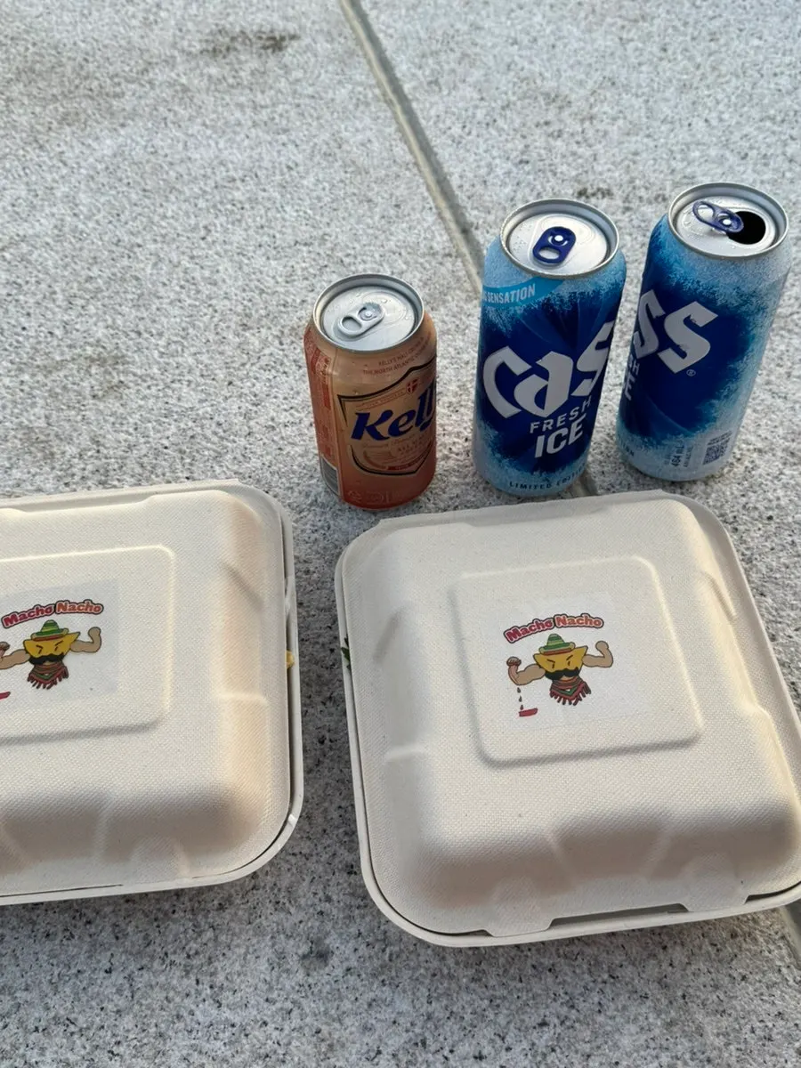 Walking with the takeout nachos toward Mangwon Hangang Park