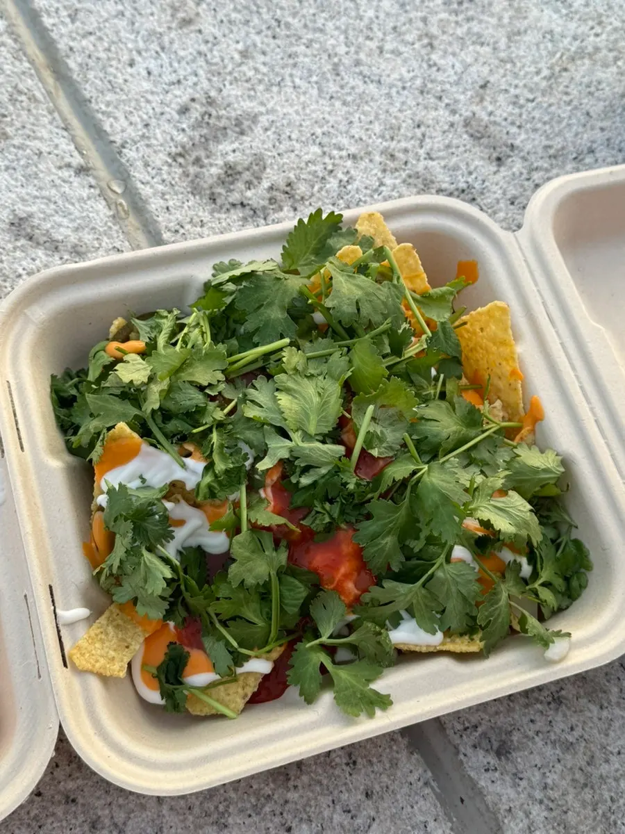 Macho Nacho topped with three sauces