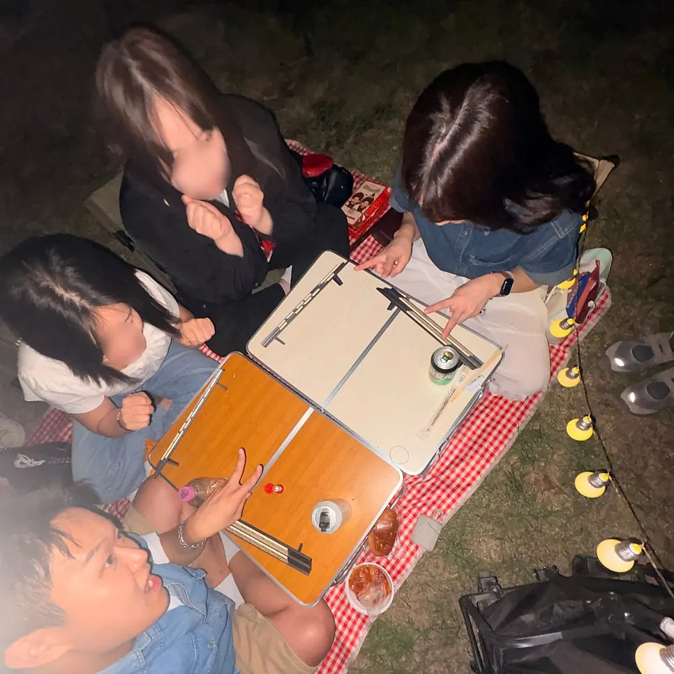 Photo with friends during the night picnic on the Han River