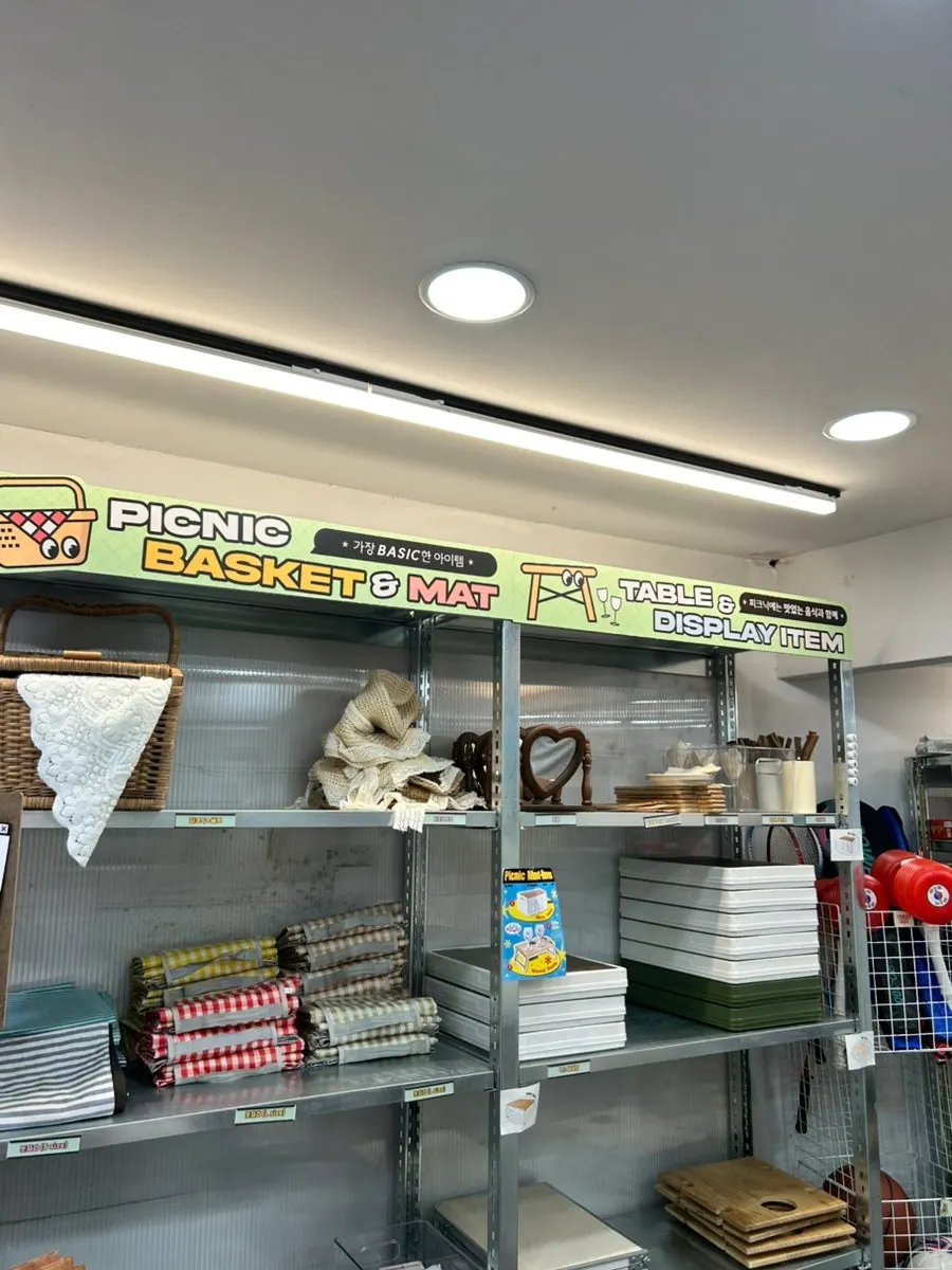 Entrance signboard listing rental items and set menus