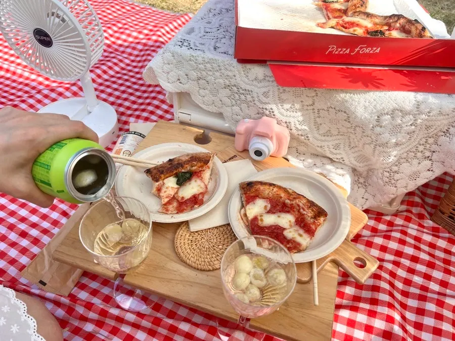 Han River picnic table set up with the wine rental set