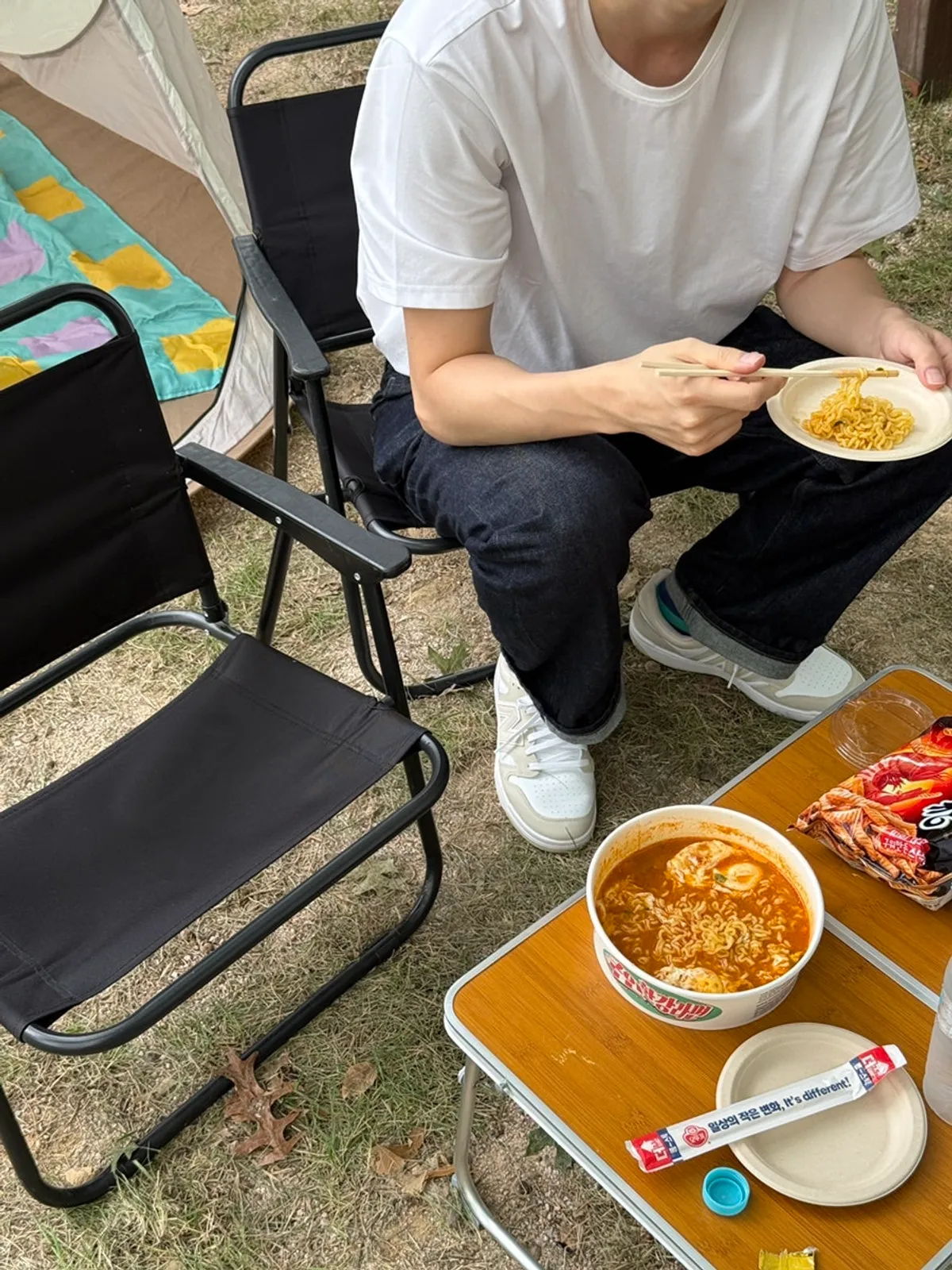 Tent and wood table picnic scene at Mangwon Han River Park