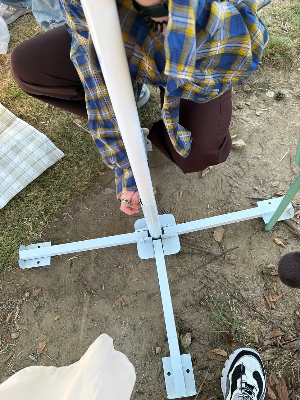 Parasol base spread out on the ground