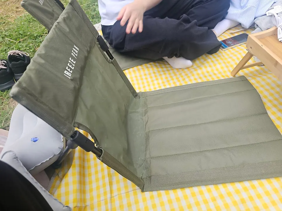Picnic setup with table and backrest chairs