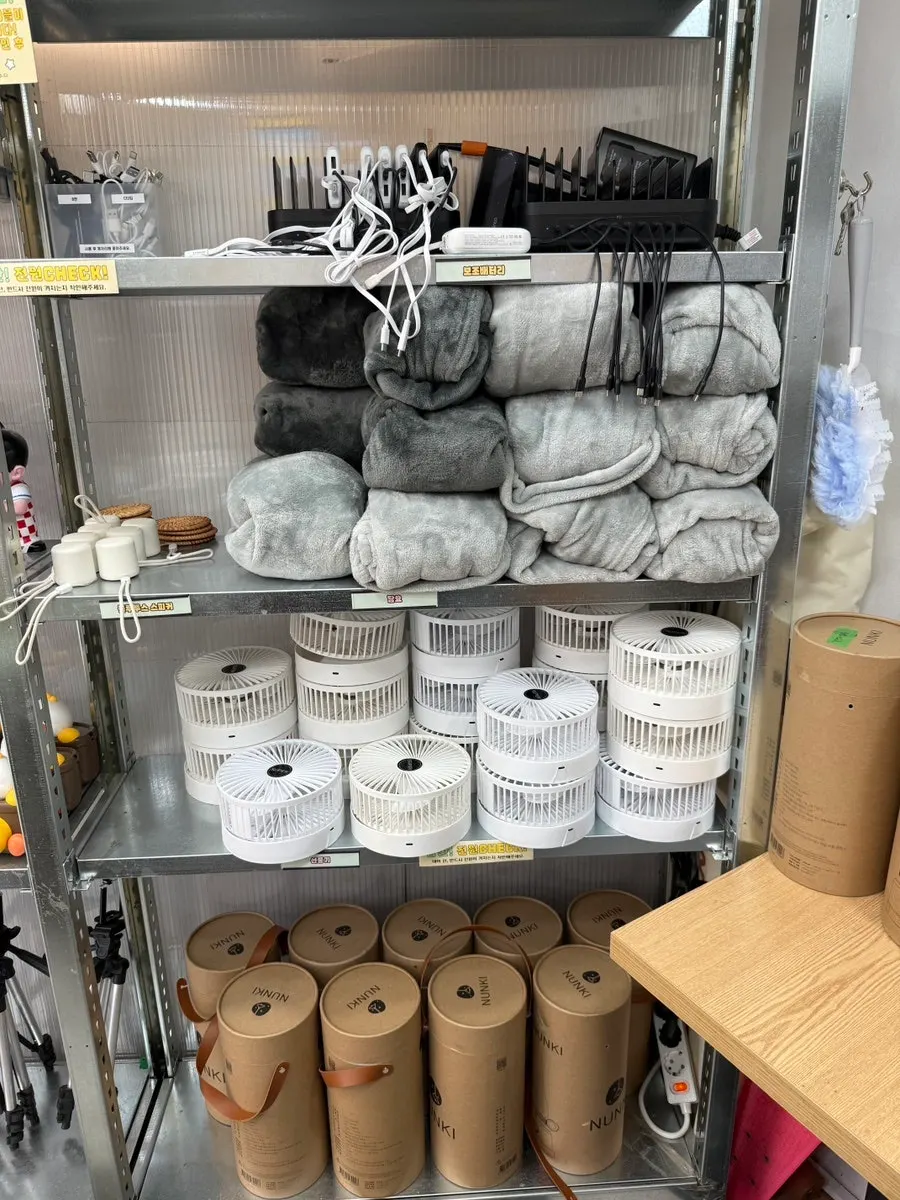 Rental corner with soccer balls, basketballs, and badminton sets
