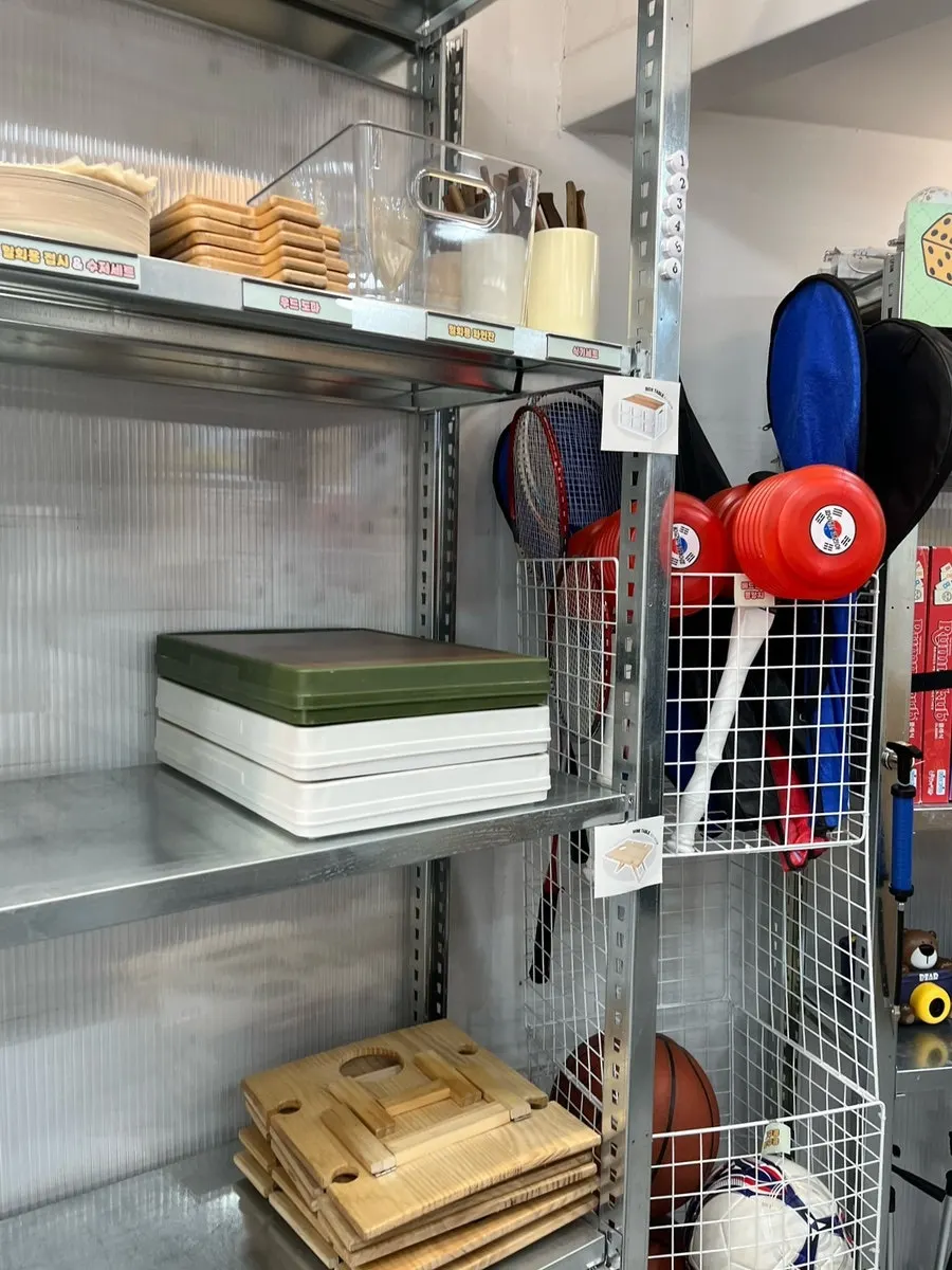 Store interior with picnic baskets and tables