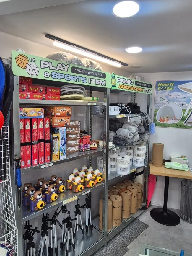 Shelves of picnic gear laid out for self-service pickup