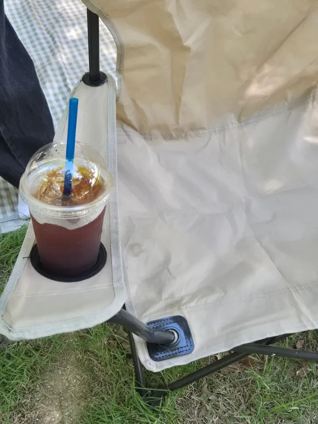 Camping chair with a drink holder and a view of the Han River