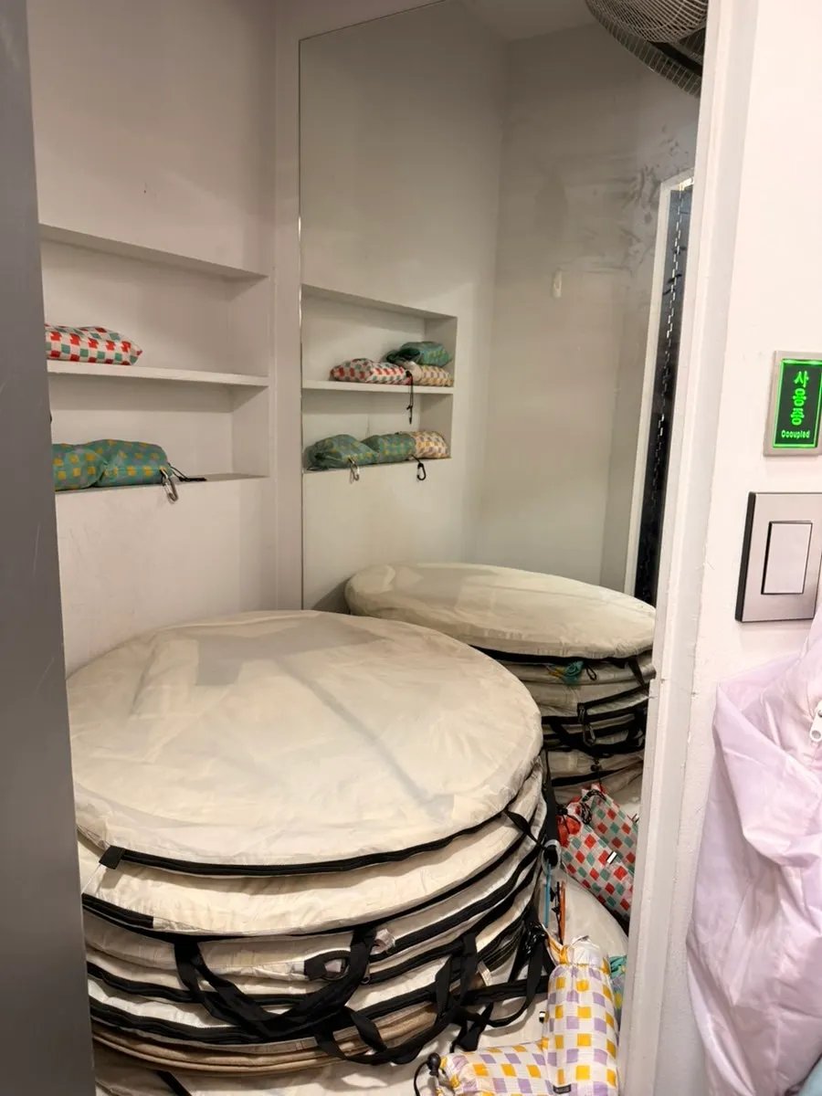Display space with mats and camping chairs