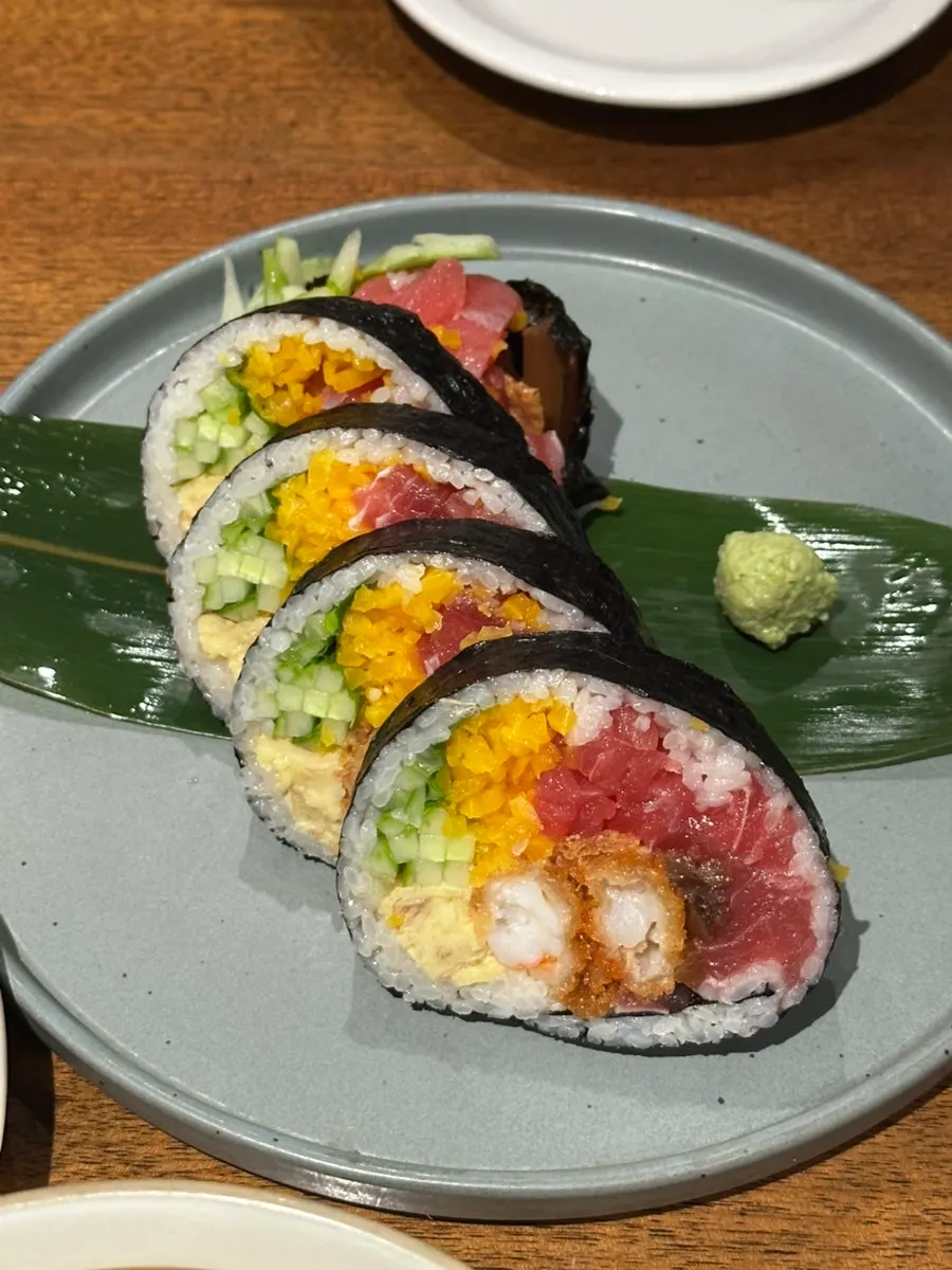 Cross-section of futomaki with tuna sashimi and fried shrimp