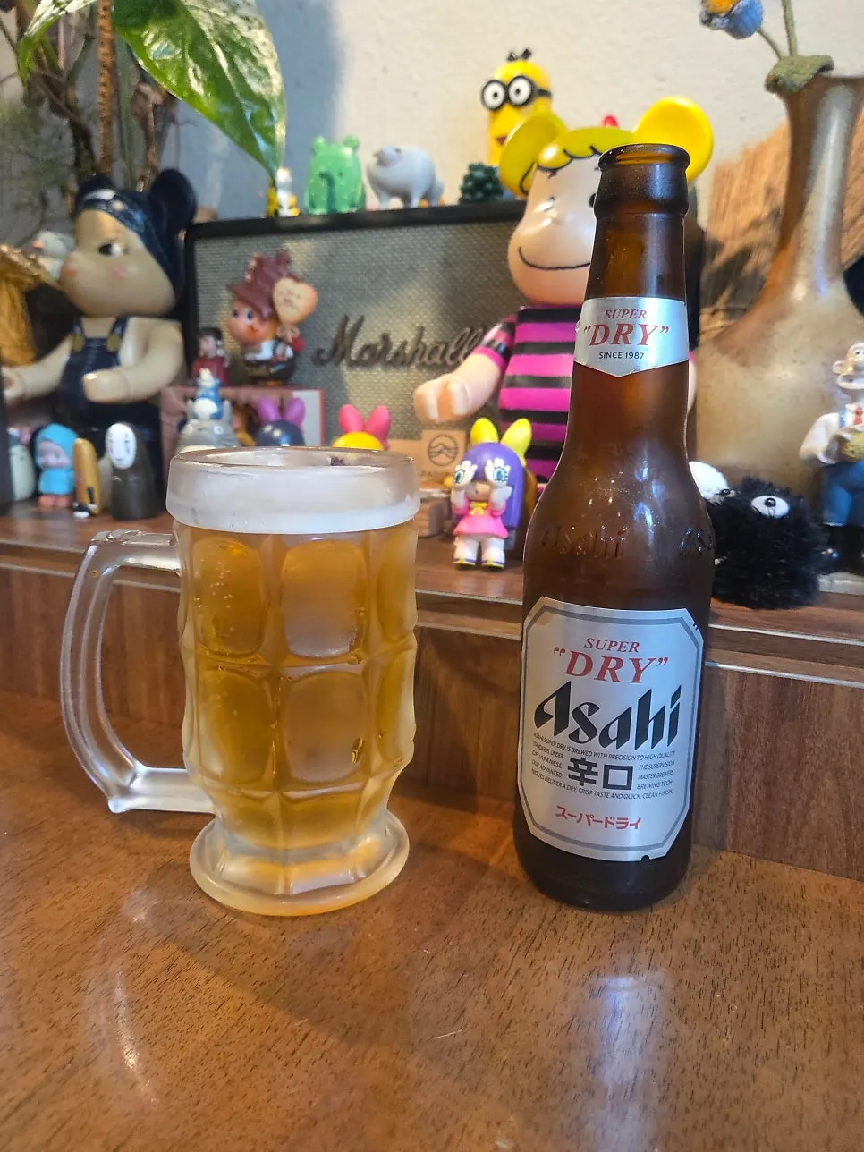 A glass of Asahi beer paired with the futomaki