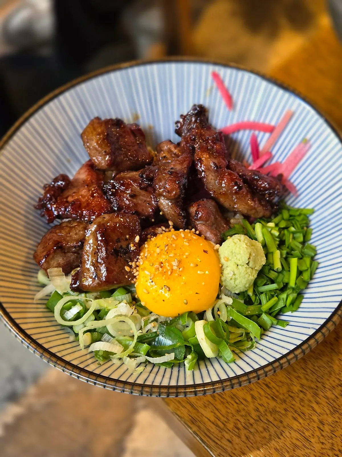 Steak donburi mixed with sauce-soaked rice and meat