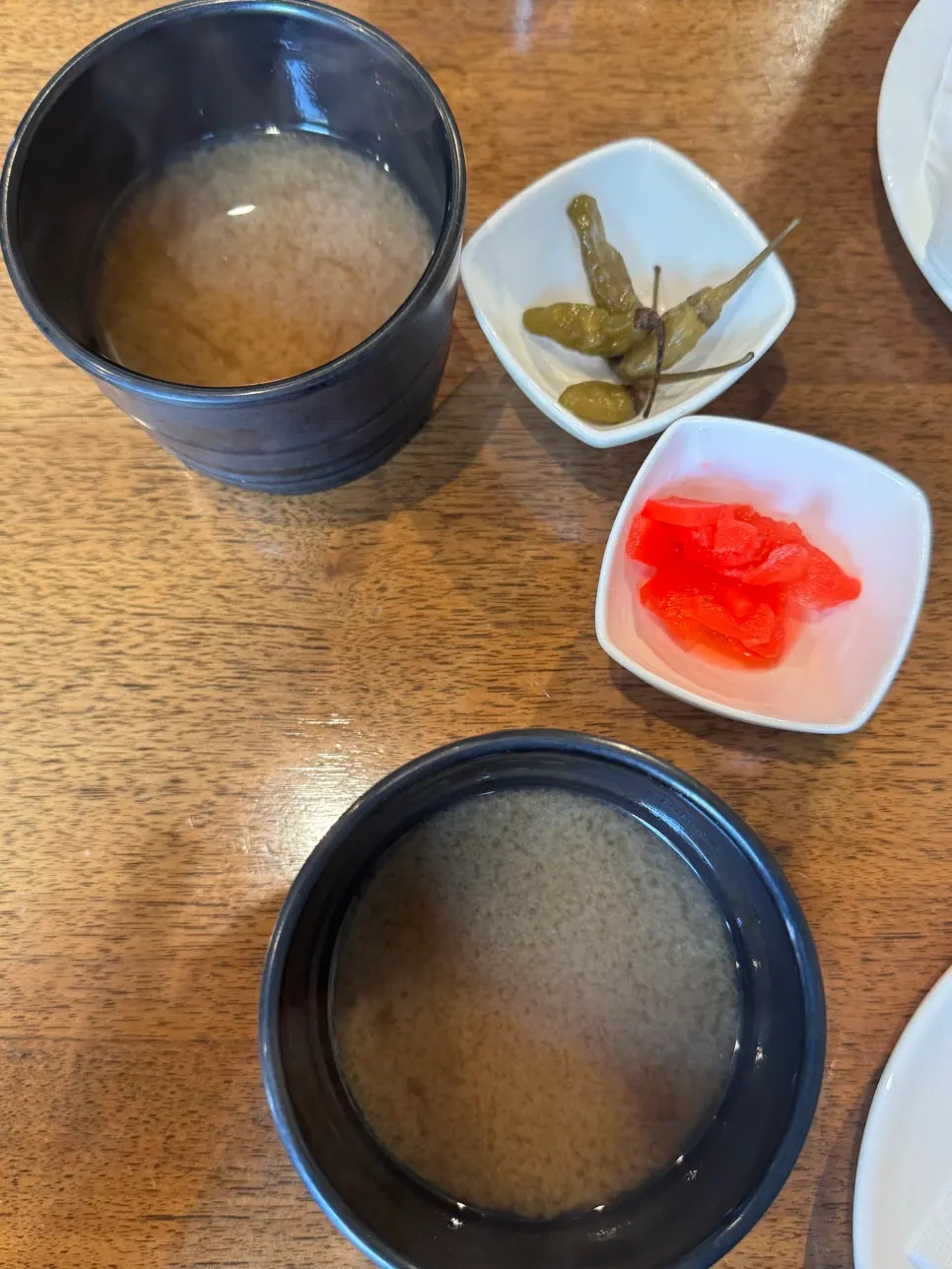 Padong's side dishes: ginger, pickled peppers, and soup