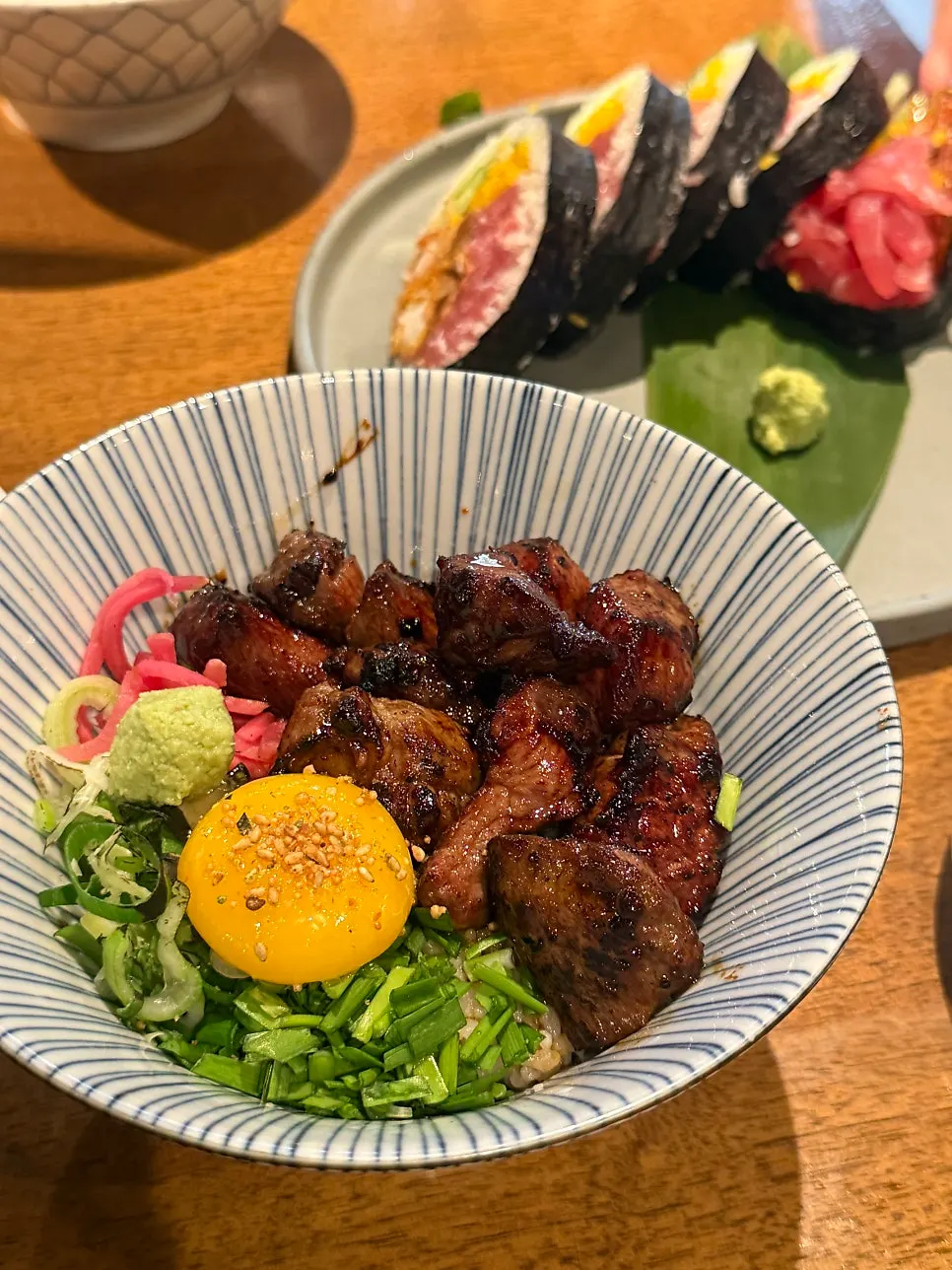 A vertical shot of Padong's steak rice bowl