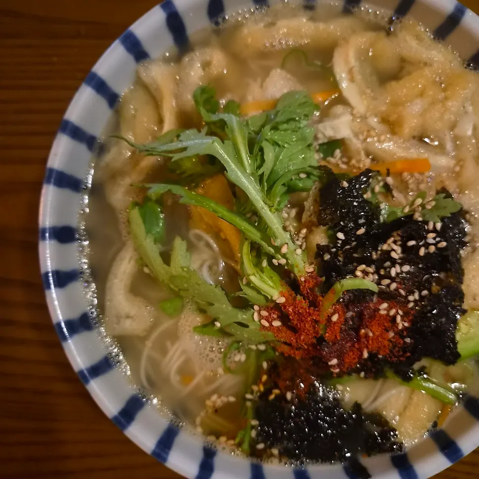 Jeongju Ilga's jangchi guksu topped with fried tofu and vegetables