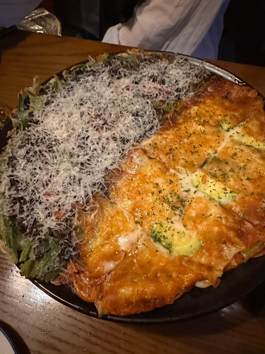Half-and-half jeon combining bulgogi chive pancake and cheese kimchi pancake