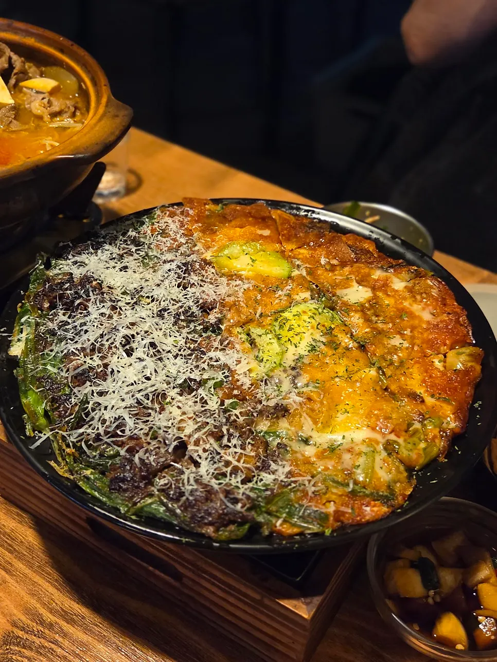 Banban-jeon with cheese kimchi pancake and bulgogi chive pancake split in half