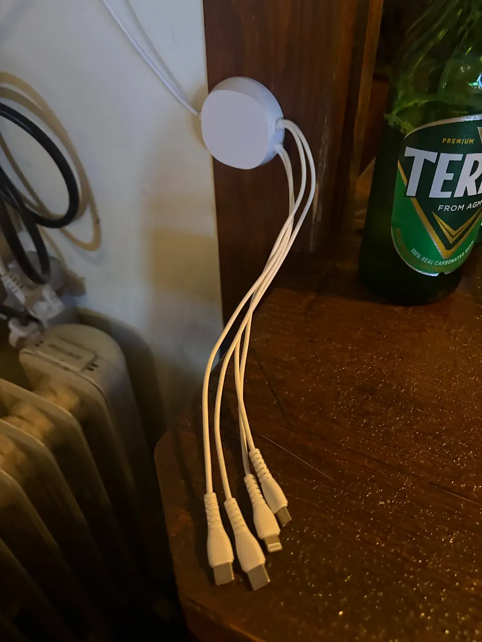 Chargers by connector type set up at the window table at Jeongju Ilga