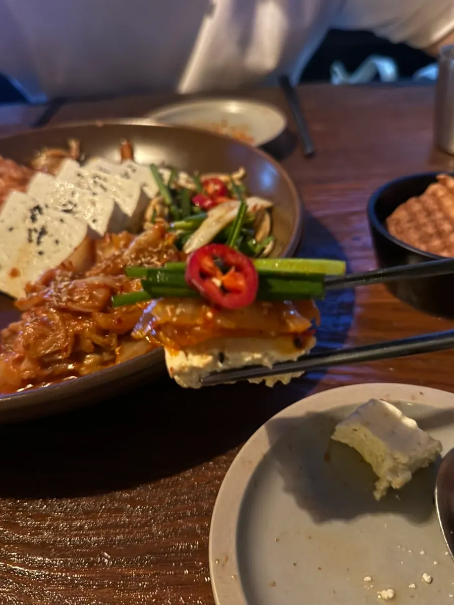 Dubu kimchi and Cheongsong apple makgeolli