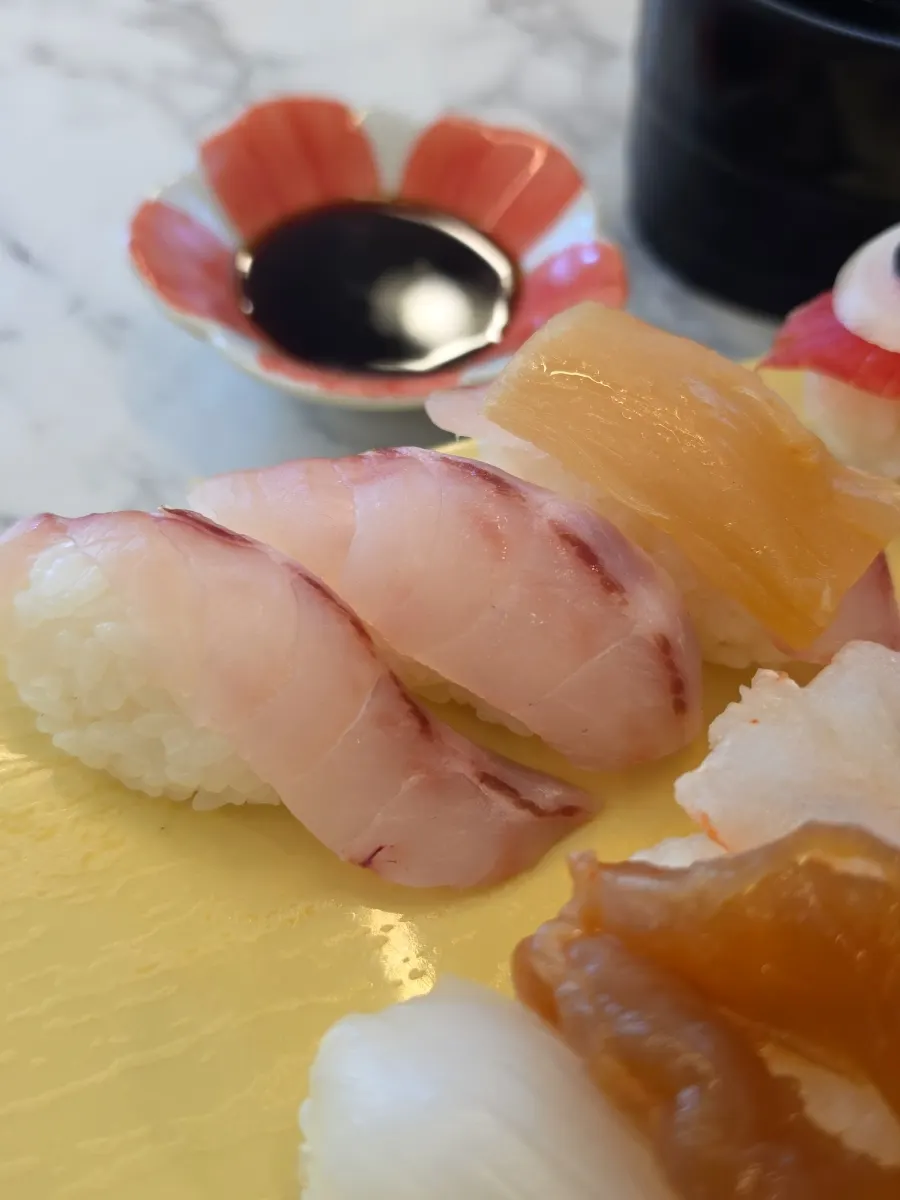 Aged kimchi sushi and eel sushi