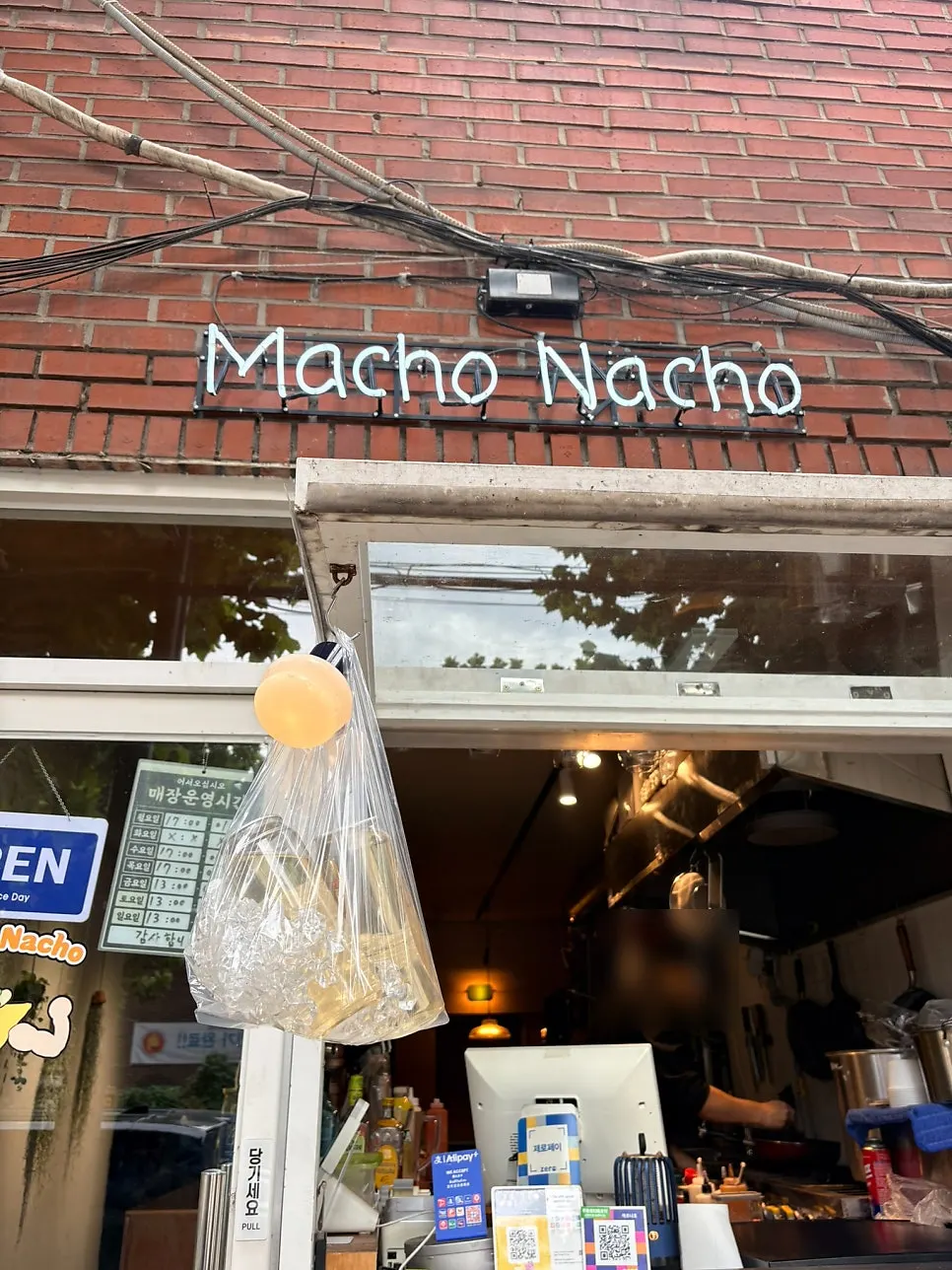 Sign outside Macho Nacho