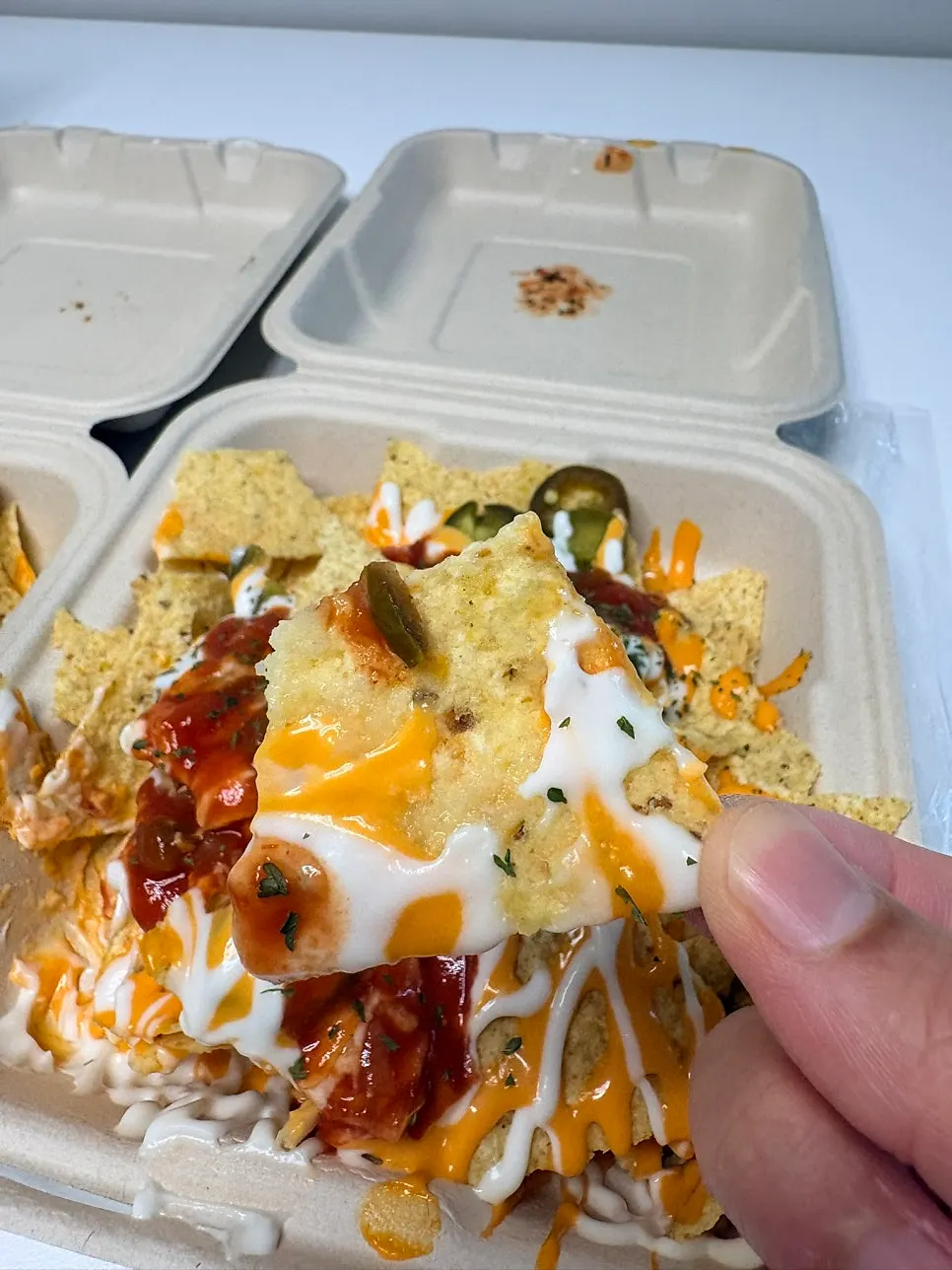 Picking up a nacho from Macho Nacho