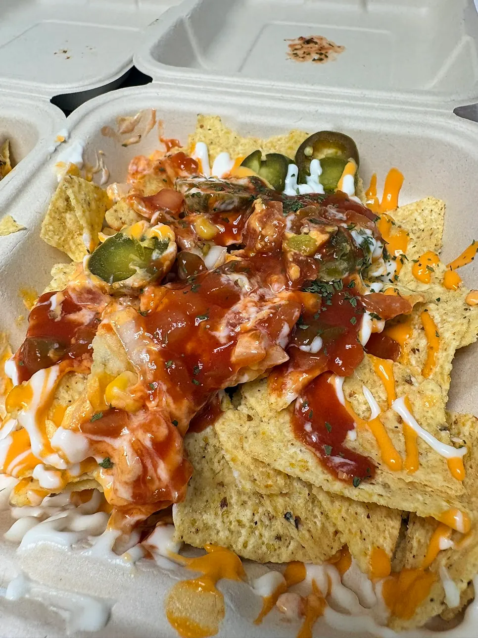 Table set with both nacho dishes for a home party