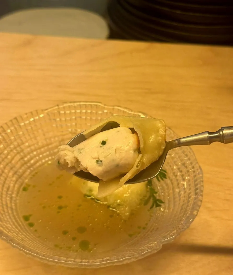 Tender chicken breast consommé dish