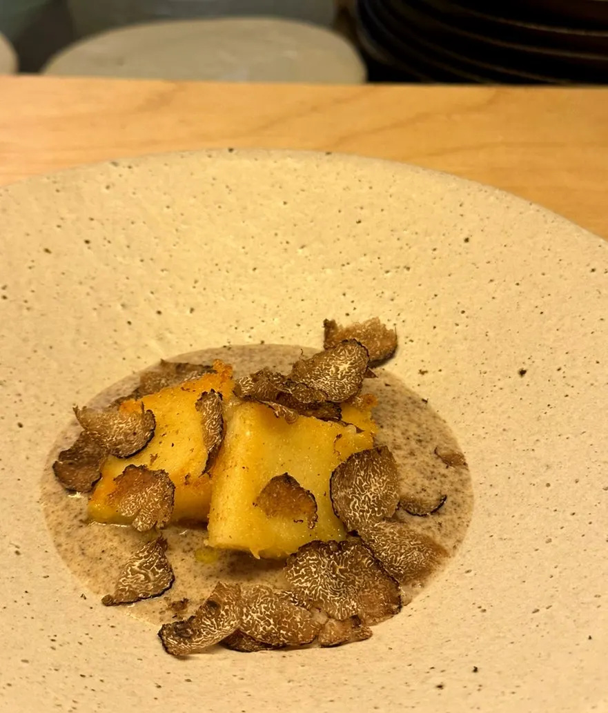 Signature gnocchi topped with summer truffle