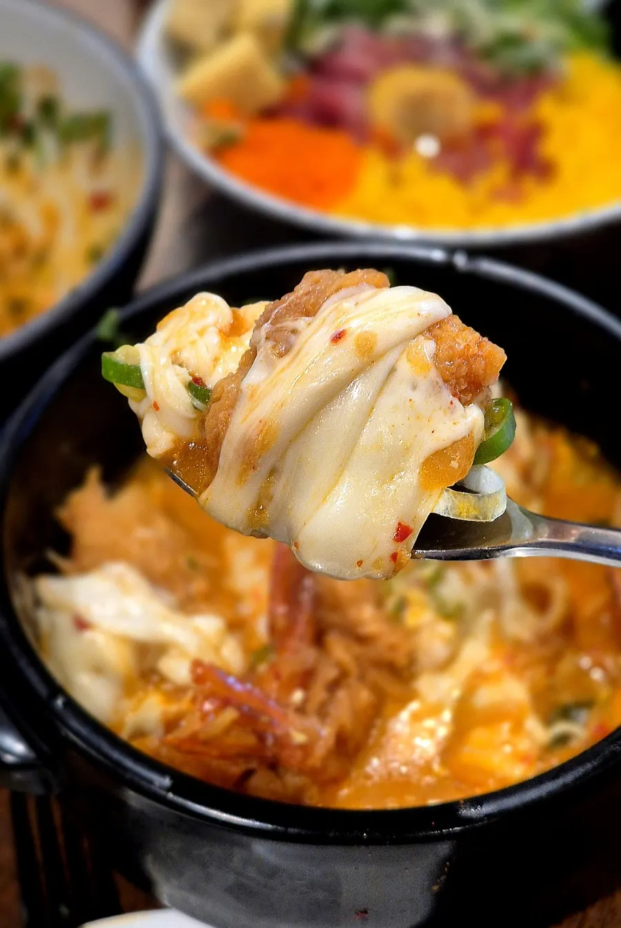Kimchi nabe topped with cheese