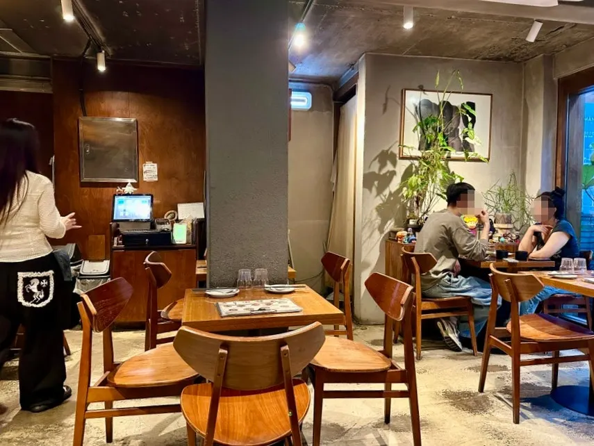 Cozy two-person table seating at Padong
