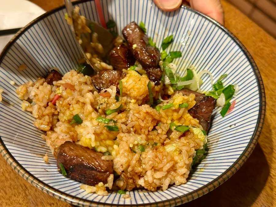 Steak rice bowl served with wasabi