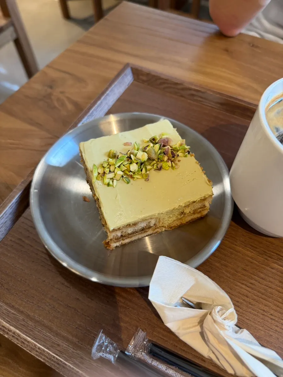 A slice of pistachio tiramisu