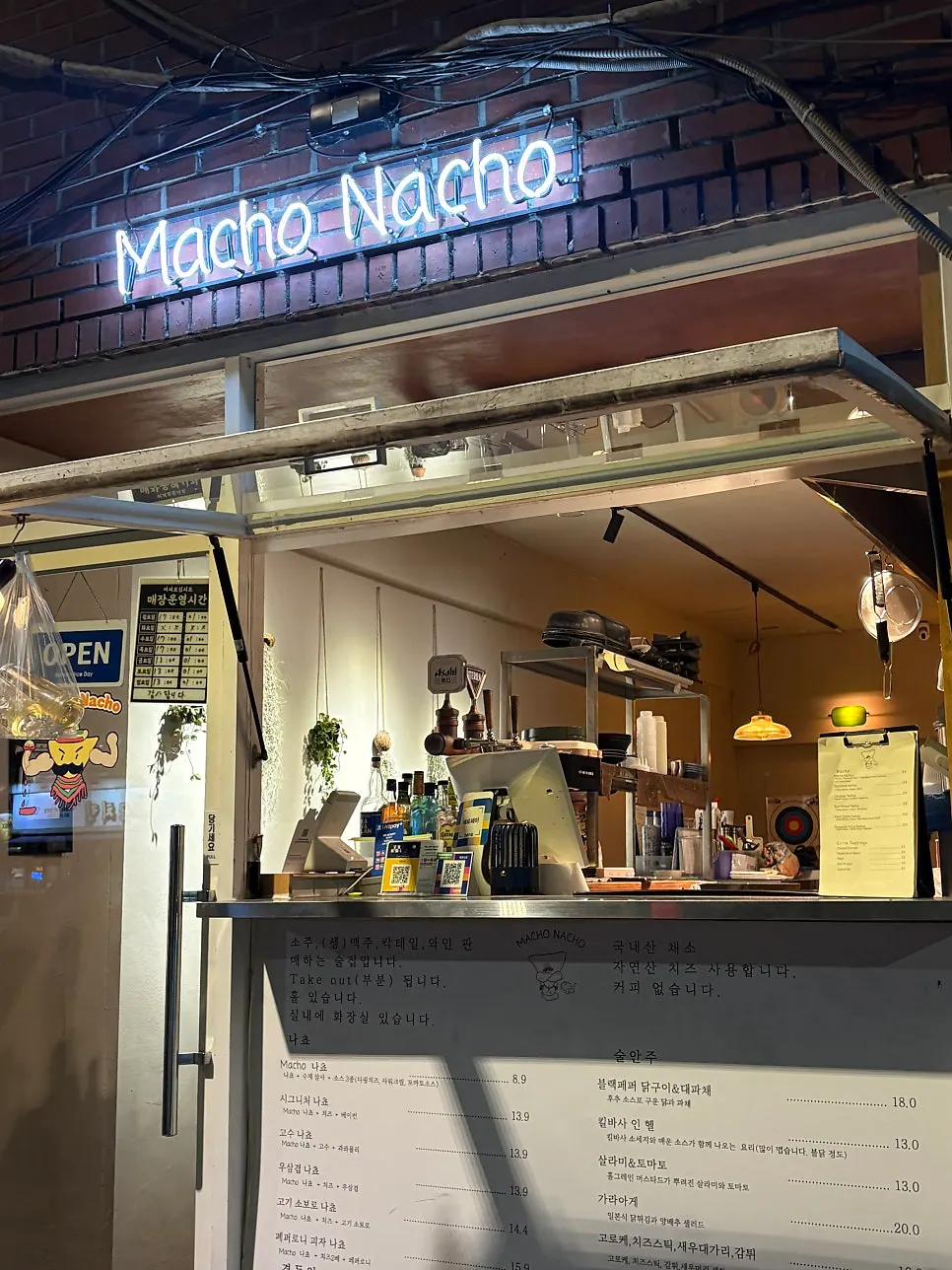 Macho Nacho's sign and open window