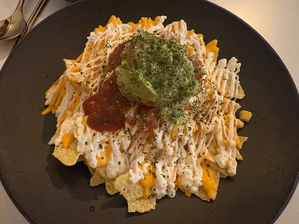 Macho Nacho's basic nachos with guacamole added
