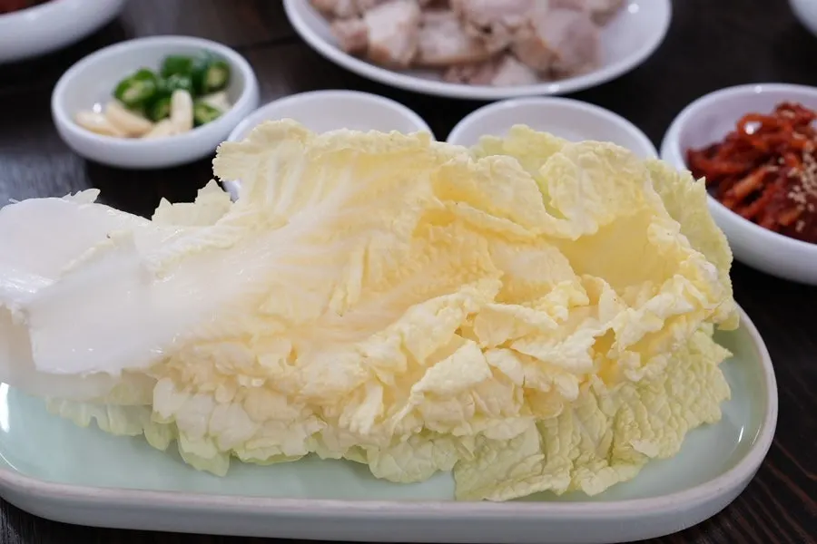 Cross-section of pork showing lean meat and fat layers