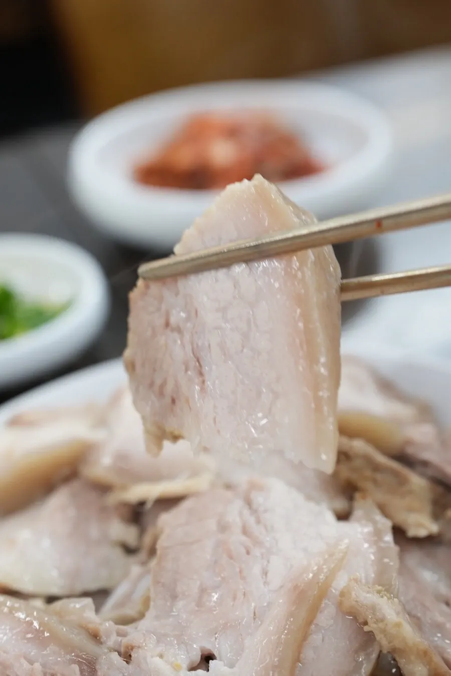 A piece of pork dipped in salted shrimp