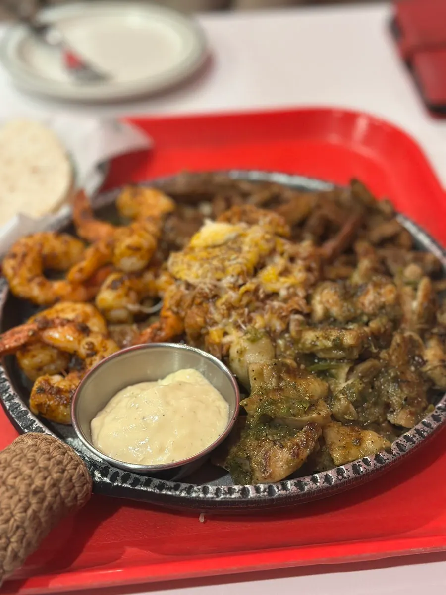 Taco Dot's grilled meat fajita platter served whole