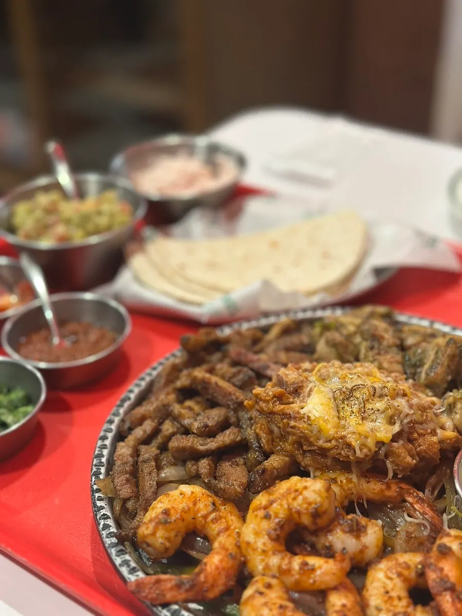 Digging into the fajita platter