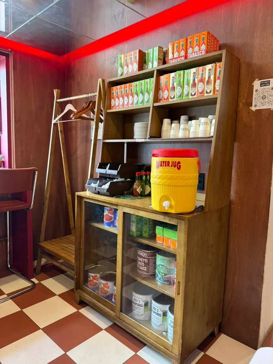 Window-side tables at Taco Dot where you sit facing the window